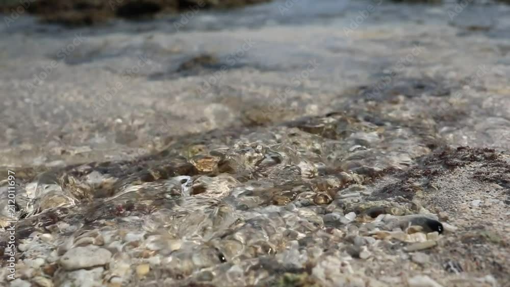 Natural outlet of groundwater on the coast of Nusa Penida Island in Indonesia - slow motion