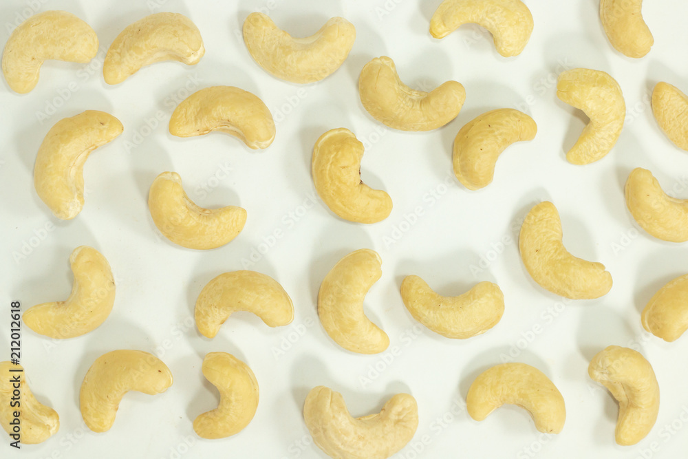 cashew nuts , yellow color beans on white background