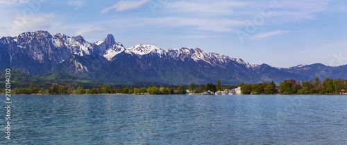 Stockhorn of Bernese Alps with lake Thun looking from street in village