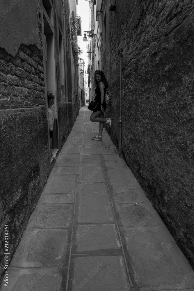 young mother and little daughter posing in  venice