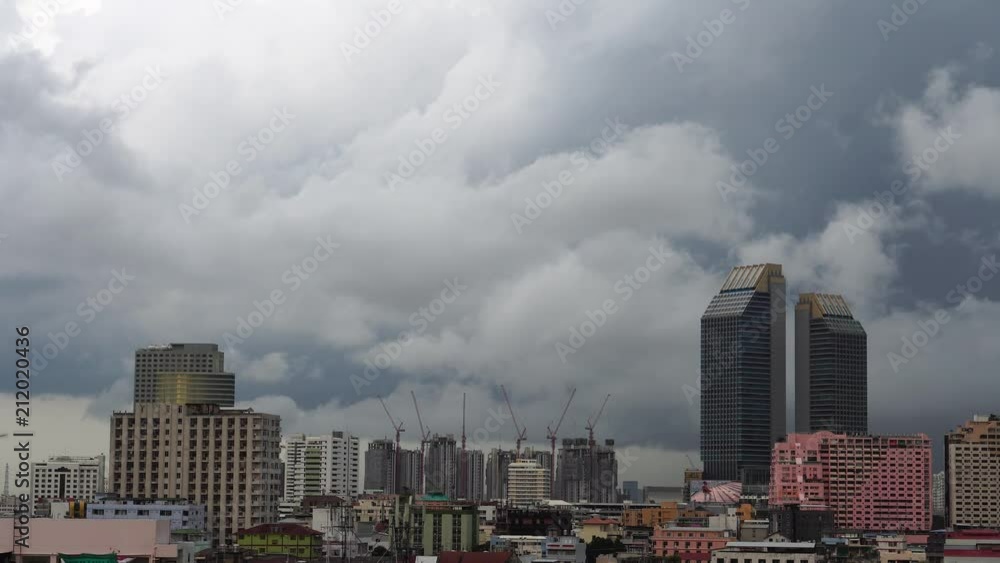 Bangkok, Thailand - June 25, 2018 : 4K Dark cloud move before raining at downtown Bangkok Bangkok, Thailand - June 25, 2018 : 4K Dark cloud move before raining at downtown Bangkok