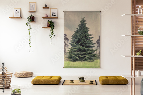 Canvas Print Yellow poufs on the floor in japanese dining room interior with tatami mat and poster