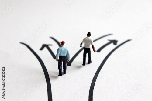 Two miniature men are walking on the other road. © Hyejin Kang
