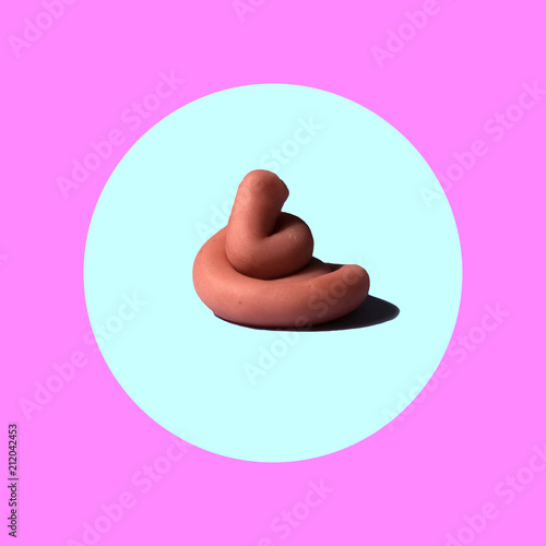 pink poo  on colorful background, funny poop concept, pop minimal contemporary style