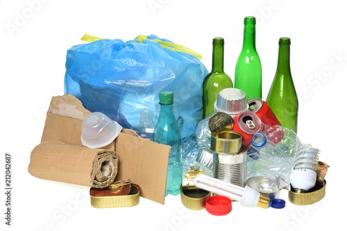 trash for recycling with paper, glass bottles, cans, plastic bottle, light bulb