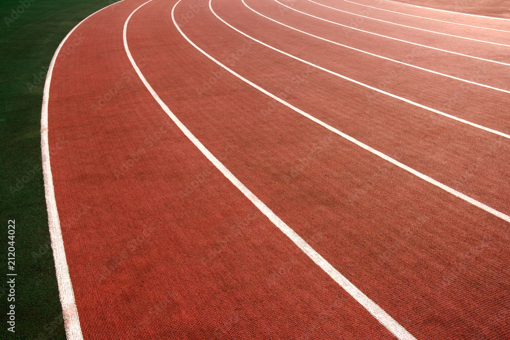 Red running track in stadium