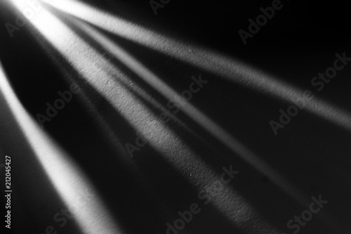 Fotografía Rays emitted from crystal on black background