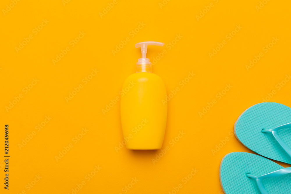 Summer beach flip flops on colored background Summer beach flip flops on colored background