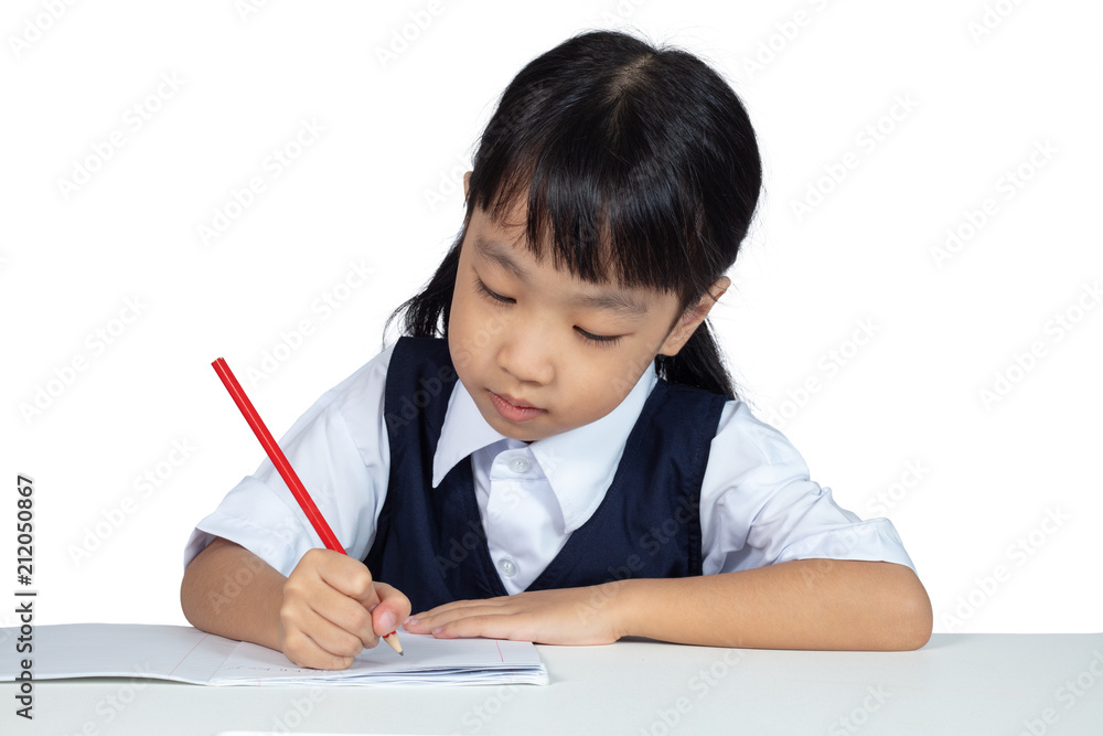 Asian Chinese little girl wearing school uniform studying Asian Chinese little girl wearing school uniform studying