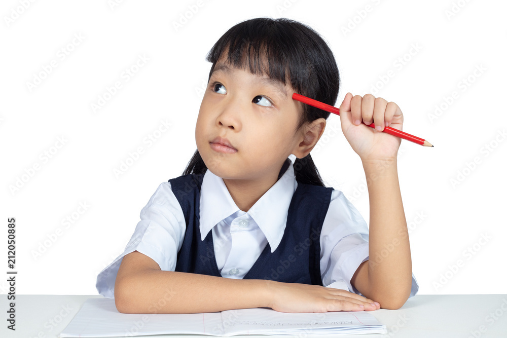 Asian Chinese little girl wearing school uniform studying Asian Chinese little girl wearing school uniform studying