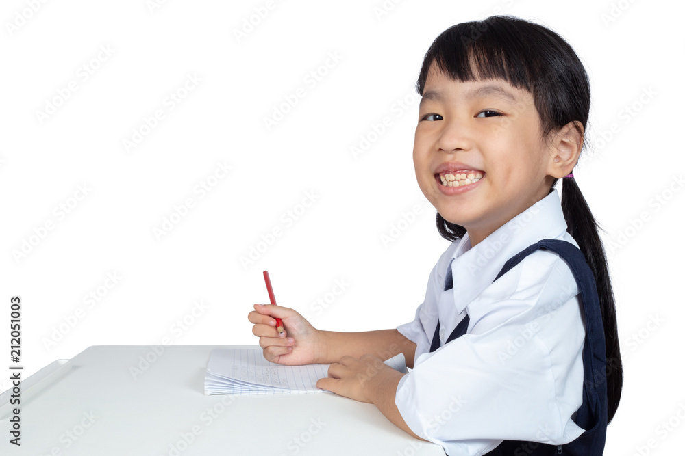 Asian Chinese little girl wearing school uniform studying Asian Chinese little girl wearing school uniform studying