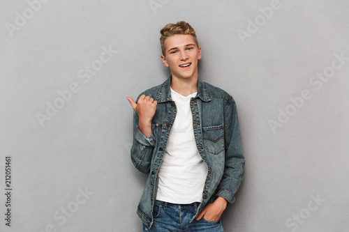 Portrait of a smiling casual teenage boy photo