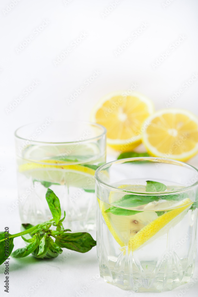 Basil lemon water. Drink infused water cocktail. Healthy lifestyle concept. Copy space