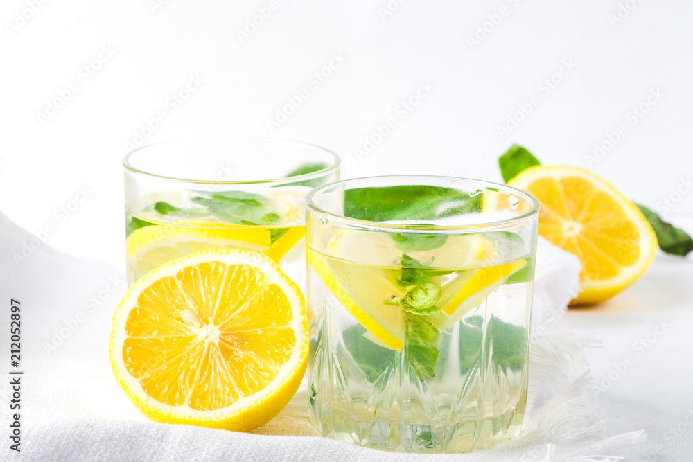 Basil lemon water. Drink infused water cocktail. Healthy lifestyle concept. Copy space Basil lemon water. Drink infused water cocktail. Healthy lifestyle concept. Copy space