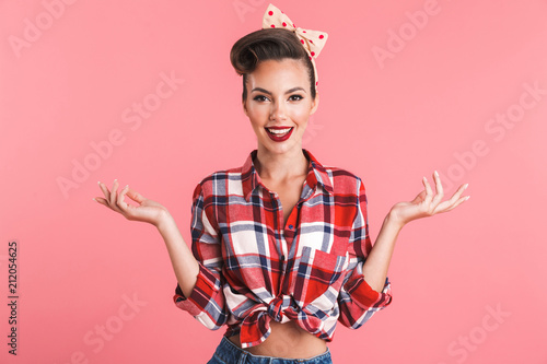 Happy young pin-up woman isolated photo