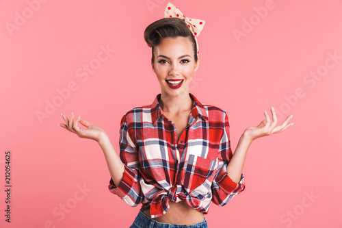 Happy young pin-up woman isolated