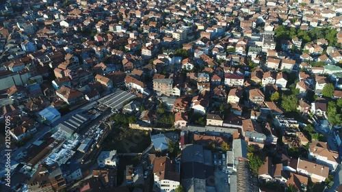 Tilted drone shot of residential neighborhood in suburbs of Pristina in Kosovo photo