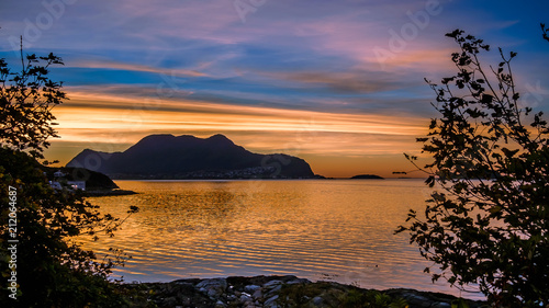 The island Godøy during sunset