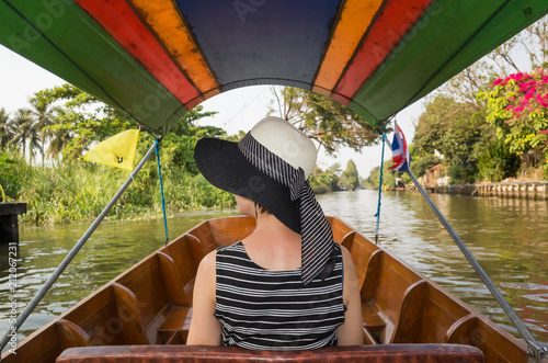 Photography woman visiting the Floating Market