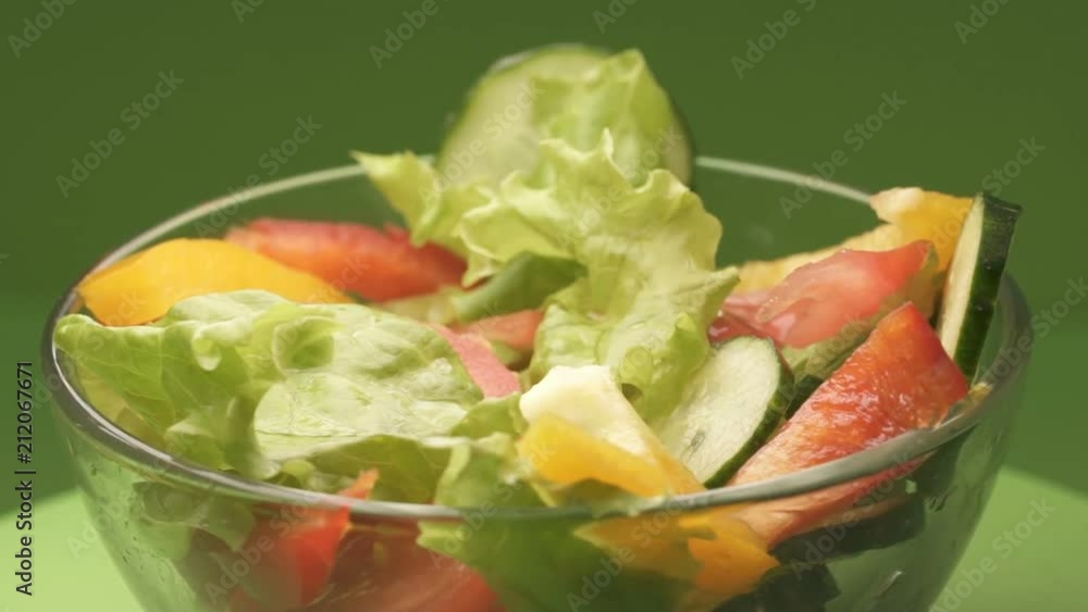Fresh vegetable salad in glass bowl, healthy nutrition, vegetarian diet food Fresh vegetable salad in glass bowl, healthy nutrition, vegetarian diet food