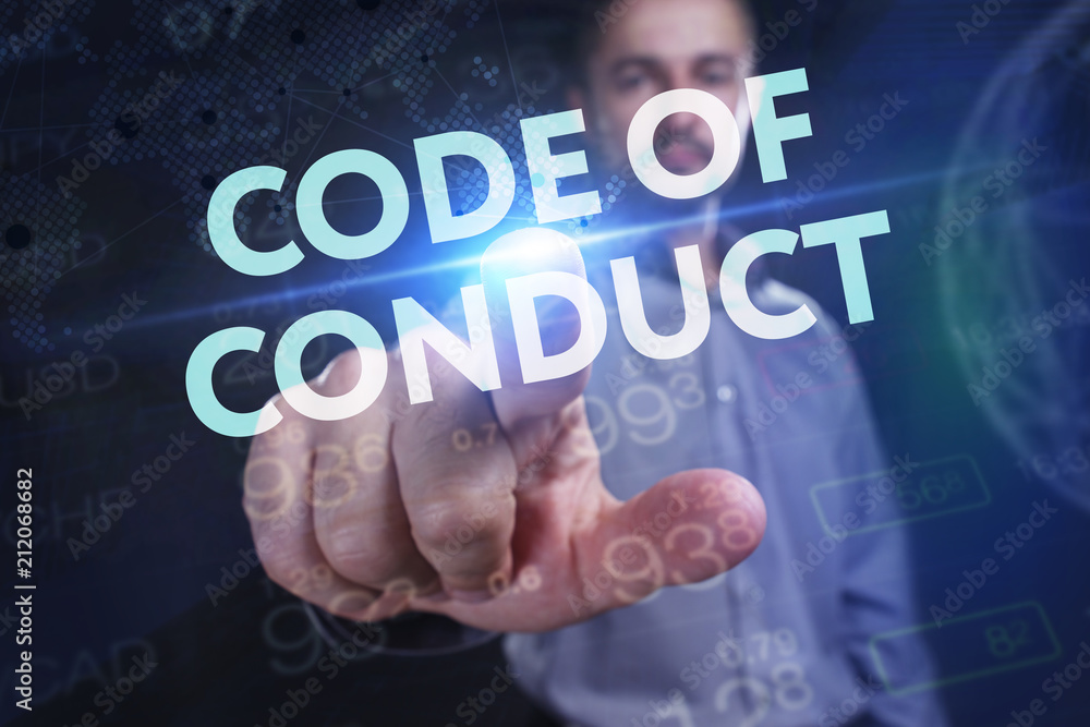The concept of business, technology, the Internet and the network. A young entrepreneur working on a virtual screen of the future and sees the inscription: Code of conduct The concept of business, technology, the Internet and the network. A young entrepreneur working on a virtual screen of the future and sees the inscription: Code of conduct