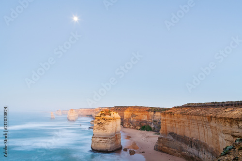 Sunrise and moonrise at the twelve Apostles along the famous Great Ocean Road in Victoria, Australia
