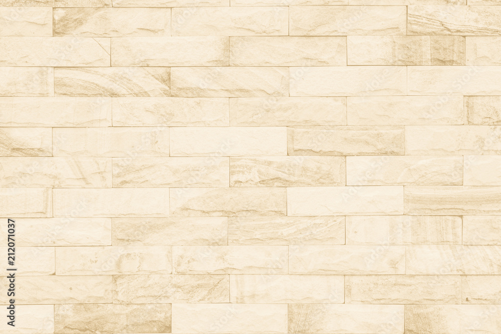 Cream and white brick wall texture background. Brickwork or stonework flooring interior rock old pattern clean concrete grid uneven bricks design stack. Cream and white brick wall texture background. Brickwork or stonework flooring interior rock old pattern clean concrete grid uneven bricks design stack.