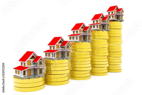 Real estate concept. house with stacks of coins photo