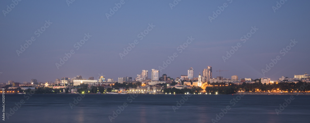 Volga river embankment in the evening in Samara, Russia. Panoramic view of the city. 3 July 2018