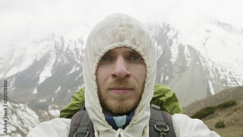 Young man in the mountains of Nepal. Manaslu circuit trek, 4500 m altitude. Young man in the mountains of Nepal. Manaslu circuit trek, 4500 m altitude.