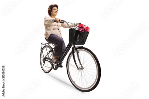 Elderly woman riding a bicycle