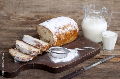 sweet bread with powdered cigars and milk