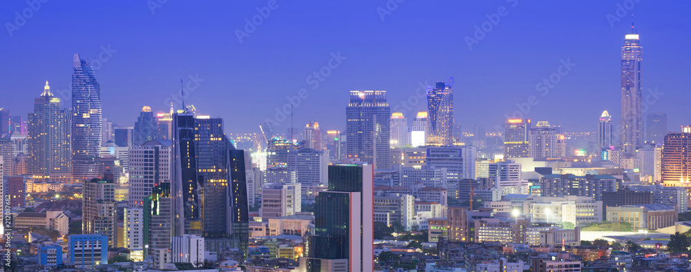 Fototapeta premium Bangkok business district panorama city skyline at night.