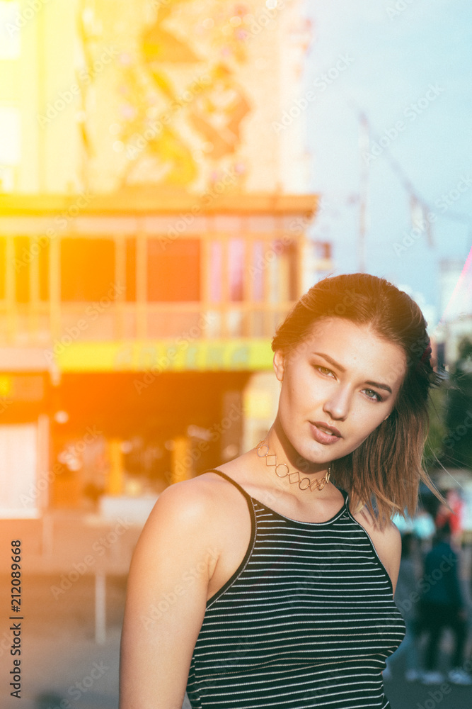 Beautiful and gorgeus blonde girl walking in an urban contest, srong personaliies and self esteem attitude,dreaming pose, natural light, flare. Beautiful and gorgeus blonde girl walking in an urban contest, srong personaliies and self esteem attitude,dreaming pose, natural light, flare.