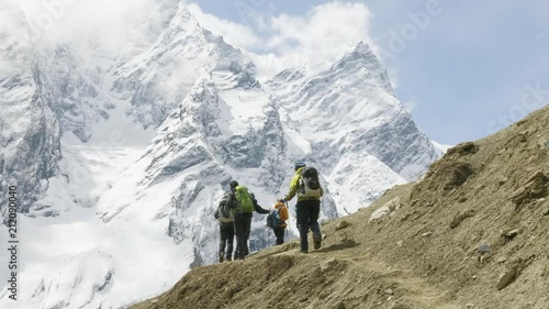 A lot of backpackers on the trekking Larke Pass in Nepal. Manaslu area.