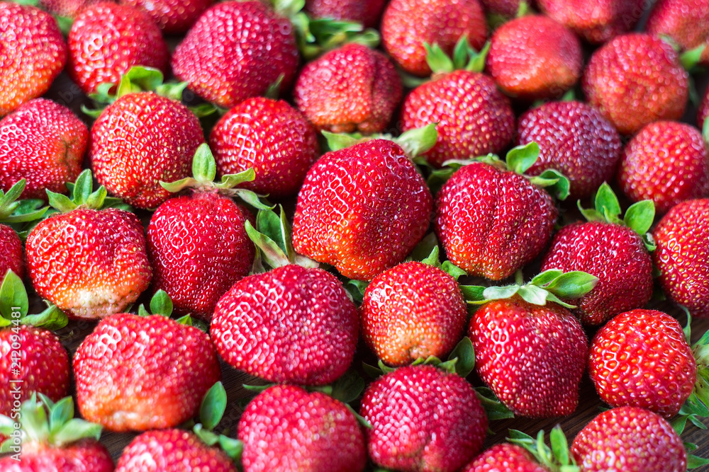 Beautiful fresh and juicy strawberries. Real fruit. Ripe strawberry texture Beautiful fresh and juicy strawberries. Real fruit. Ripe strawberry texture