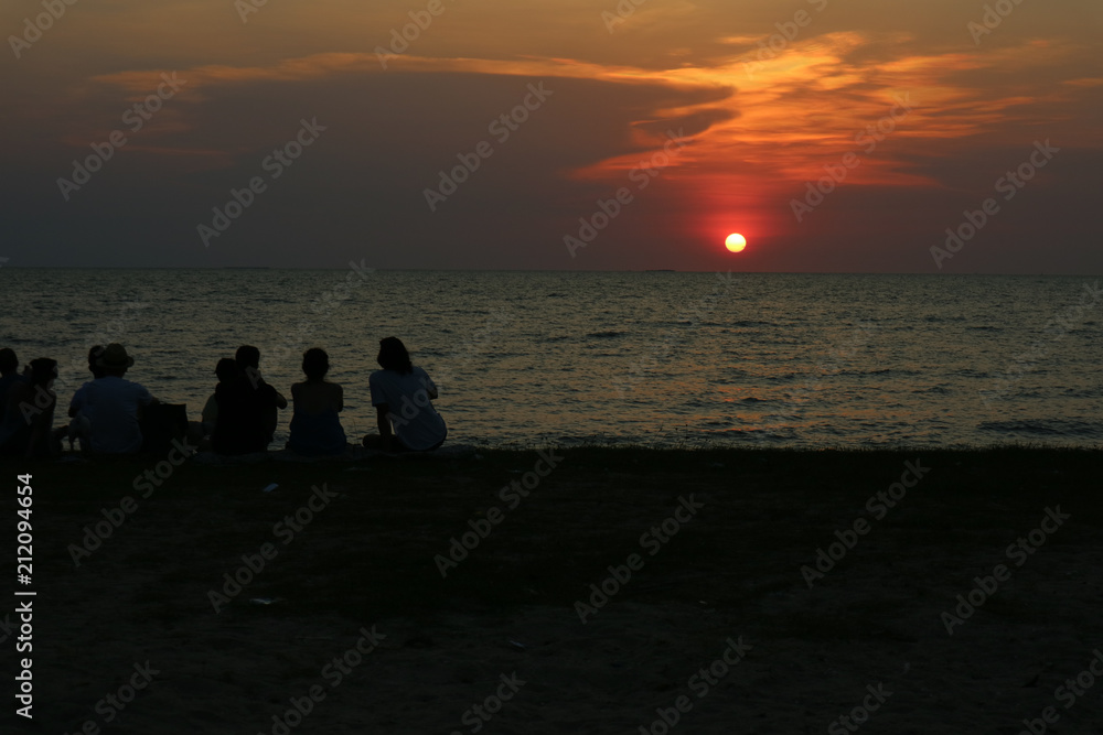 silhouette all people meeting look sunset sky on beach