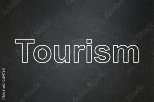 Tourism concept: text Tourism on Black chalkboard background