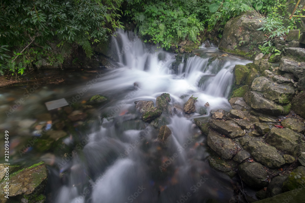 Small waterfall in the tropical jungle Small waterfall in the tropical jungle