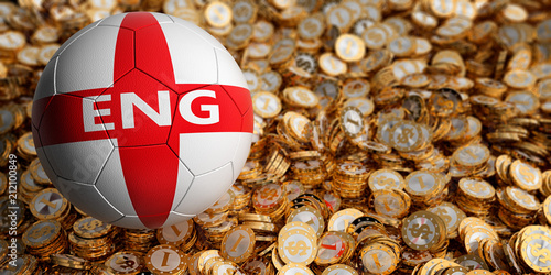 Soccer ball in englands national colors on golden coins photo