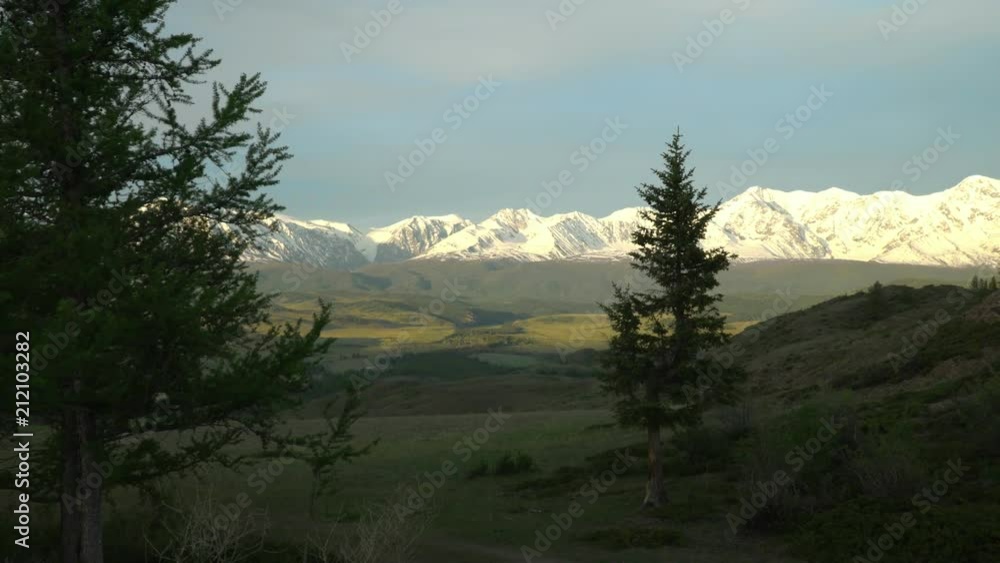 Beautiful view of the valley and snow mountains. Mountain landscape. Beautiful view of the valley and snow mountains. Mountain landscape.