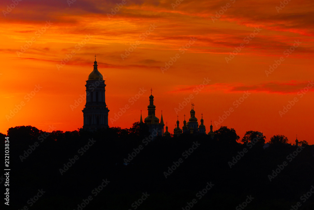 siluette to Lavra monastery, Kiev landmark. Red sunset