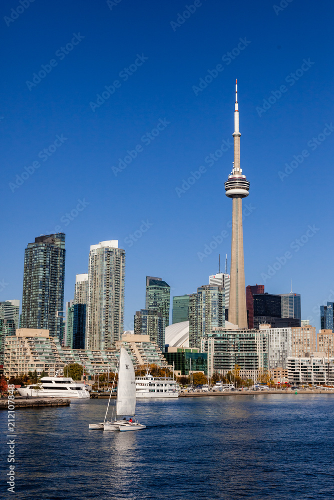 Sailboat on the harbour with CN Tower in Background.