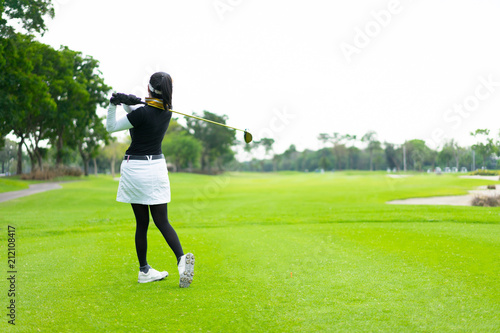 Victory in golf from a feminine focus.