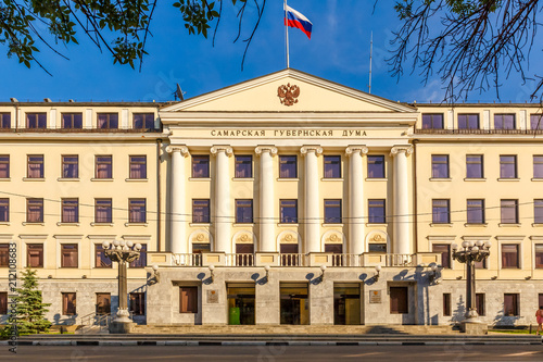 Russia, Samara, May 2016: The building of the Samara province Duma with the flag of Russia on a sunny day against the sky photo