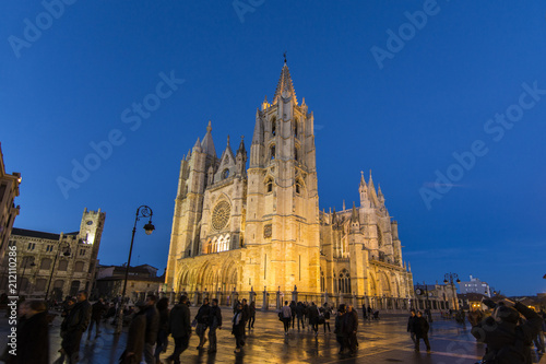 Tourists walking around the Cathedral of Leon illuminated at night  Spain