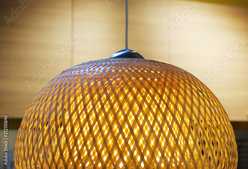 The green fabric lampshade at the magazine. colorful, decorative, electrical, furniture, illumination, lamp, lampshade, style, textile, abstract background, hanging lamp, interior design photo