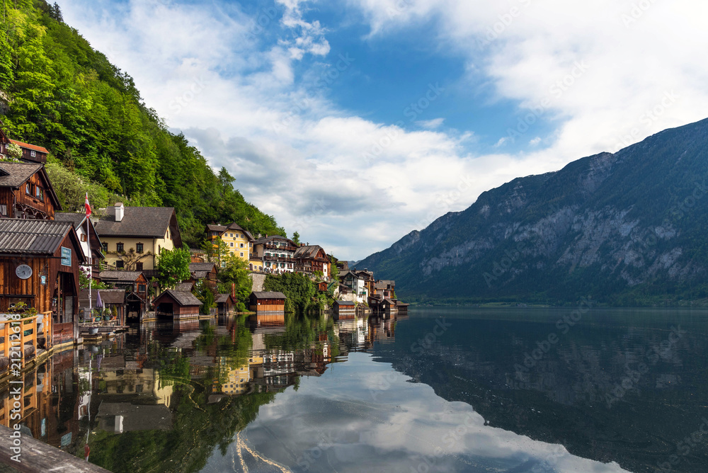 Scenic postcard view of the famous Hallstatt in the Austrian Alps in the summer morning, Salzkammergut district, Austria. View from the south