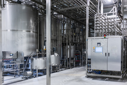 Cylinders in beverage factory. Industrial photography.