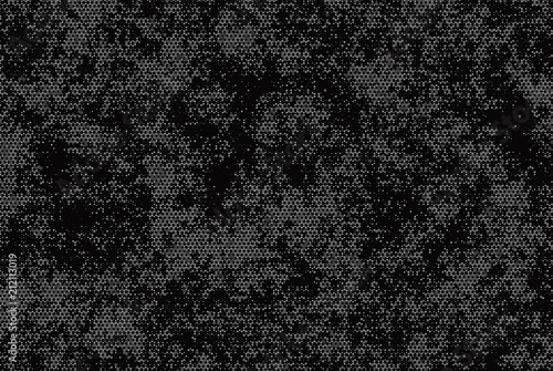 Grunge halftone pattern. Abstract background with dots, points of different sizes scattered around. Perforated surface with holes